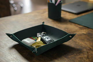 Leather pocket emptyer